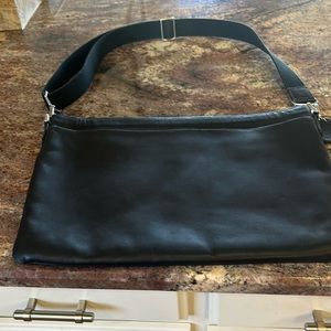 Coach computer bag. Never used. Black color. Coach tag on bag.